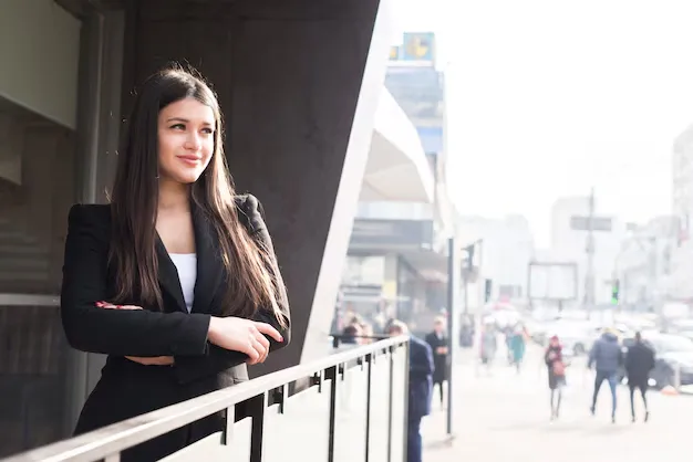 brunette-businesswoman-posing-outdoors_23-2148142828 (1).webp