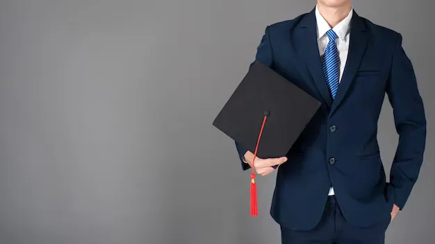 business-man-is-holding-graduation-hat-business-education-concept_33799-2167.webp