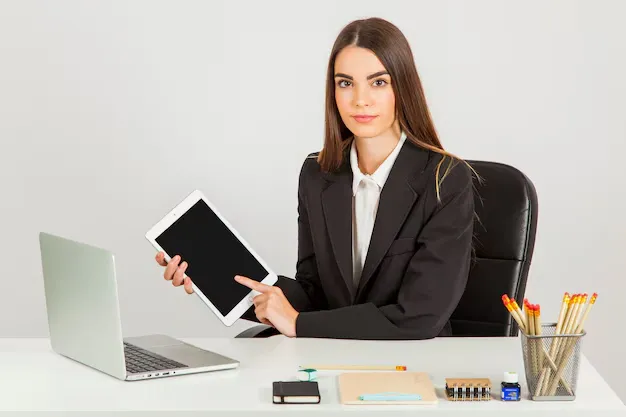 businesswoman-working-with-tablet_23-2147636027 (1).webp