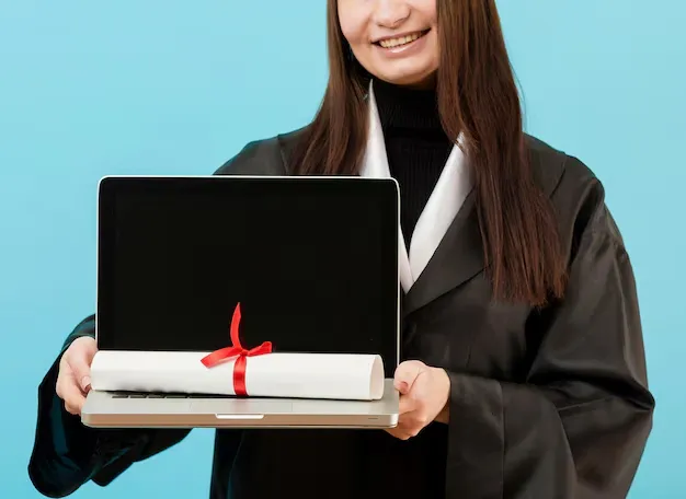 close-up-girl-holding-laptop_23-2148499004.webp