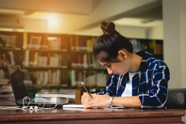 closeup-woman-student-reading-book_35934-227 (1).webp