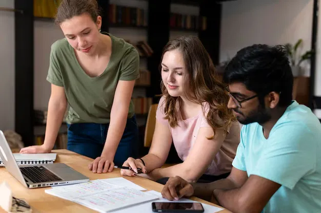 college-mates-studying-together_23-2149038399.webp