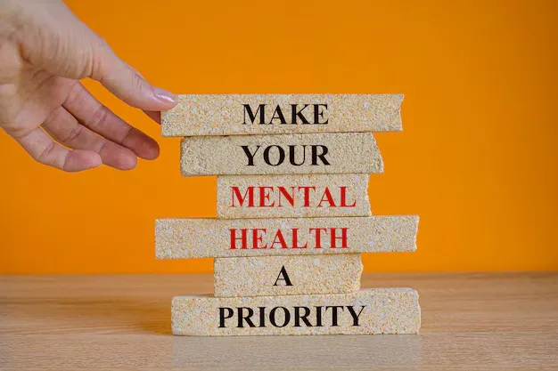 concept-words-make-your-mental-health-priority-brick-blocks-beautiful-orange-background_606207-1406.webp