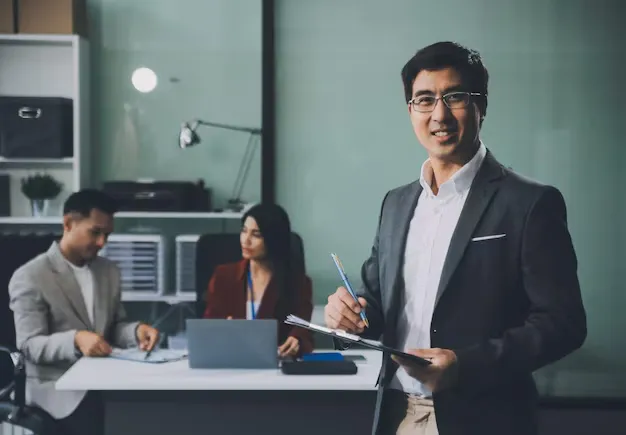 group-colleagues-engaging-discussion-business-meeting-conference-room-happy-business-people-men-women-collaborating-working-towards-their-shared-goals_265022-99148.webp
