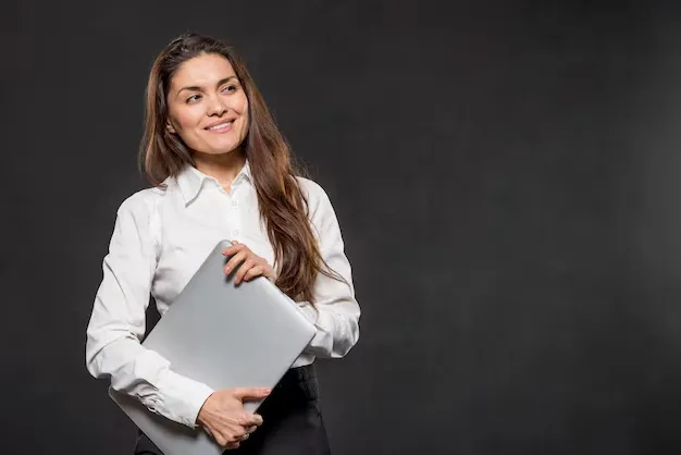 low-angle-woman-holding-laptop_23-2148435549.webp