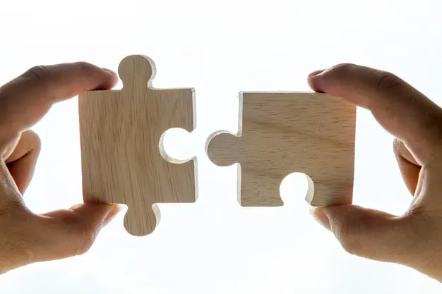 macro-shot-jigsaw-puzzles-teamwork-concept_53876-32058.webp