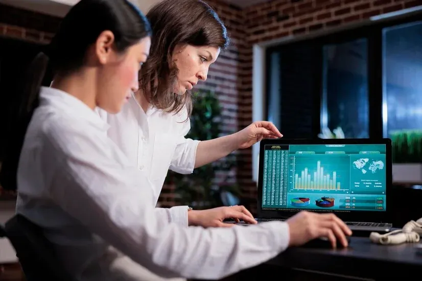 marketing-agency-employees-discussing-about-bankruptcy-while-analyzing-financial-data-laptop-screen-business-company-office-workers-sitting-desk-while-reviewing-startup-project-state_482257-40706.webp