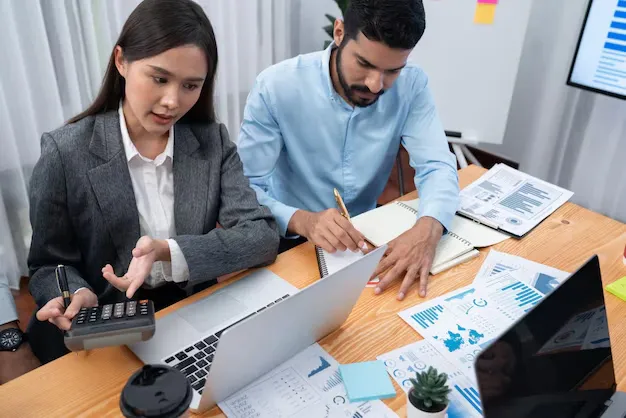 multiracial-analyst-team-use-bi-dashboard-data-analyze-financial-report-meeting-table-group-diverse-business-people-utilize-data-analysis-by-fintech-business-marketing-decision-concord_31965-228385.webp