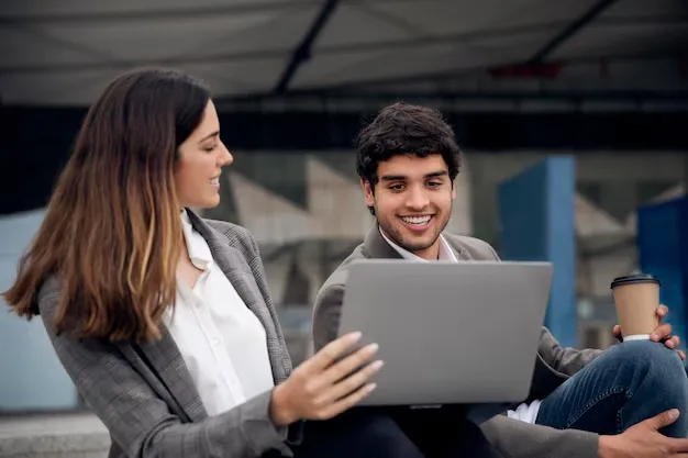 people-with-laptop-outdoors-medium-shot_23-2149005847.webp