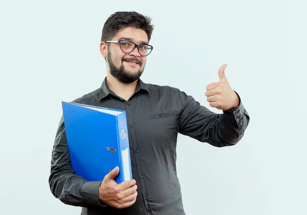pleased-young-businessman-wearing-glasses-holding-folder-his-thumb-up-isolated-white-background_141793-63475.webp