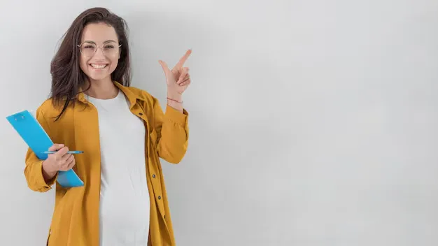 smiley-pregnant-woman-holding-clipboard-pointing-up-with-copy-space_23-2148765097.webp