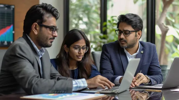 team-indian-financial-consultants-man-woman-using-laptop-plan-stock-market-strategies-stylish-office_1291600-4230.webp