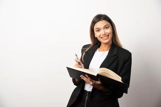 young-businesswoman-holding-opened-clipboard-with-pencil_114579-47011 (1).webp