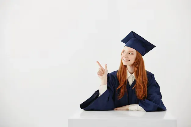 young-female-university-graduate-academic-cap-sitting-table-smiling-pointing-left-future-lawyer-engineer-showing-idea_176420-14245 (2).webp